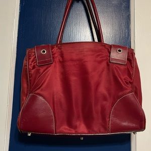 Vintage vibes Prada handbag in a deep red/cranberry color